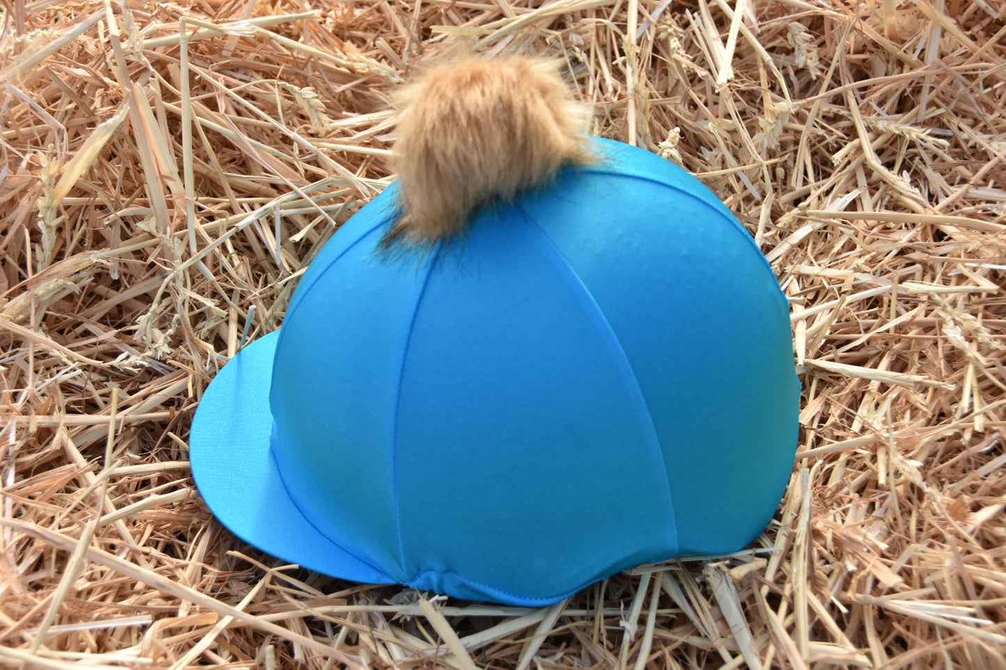 Capz Blue Lycra Hat Silk With Pom Pom